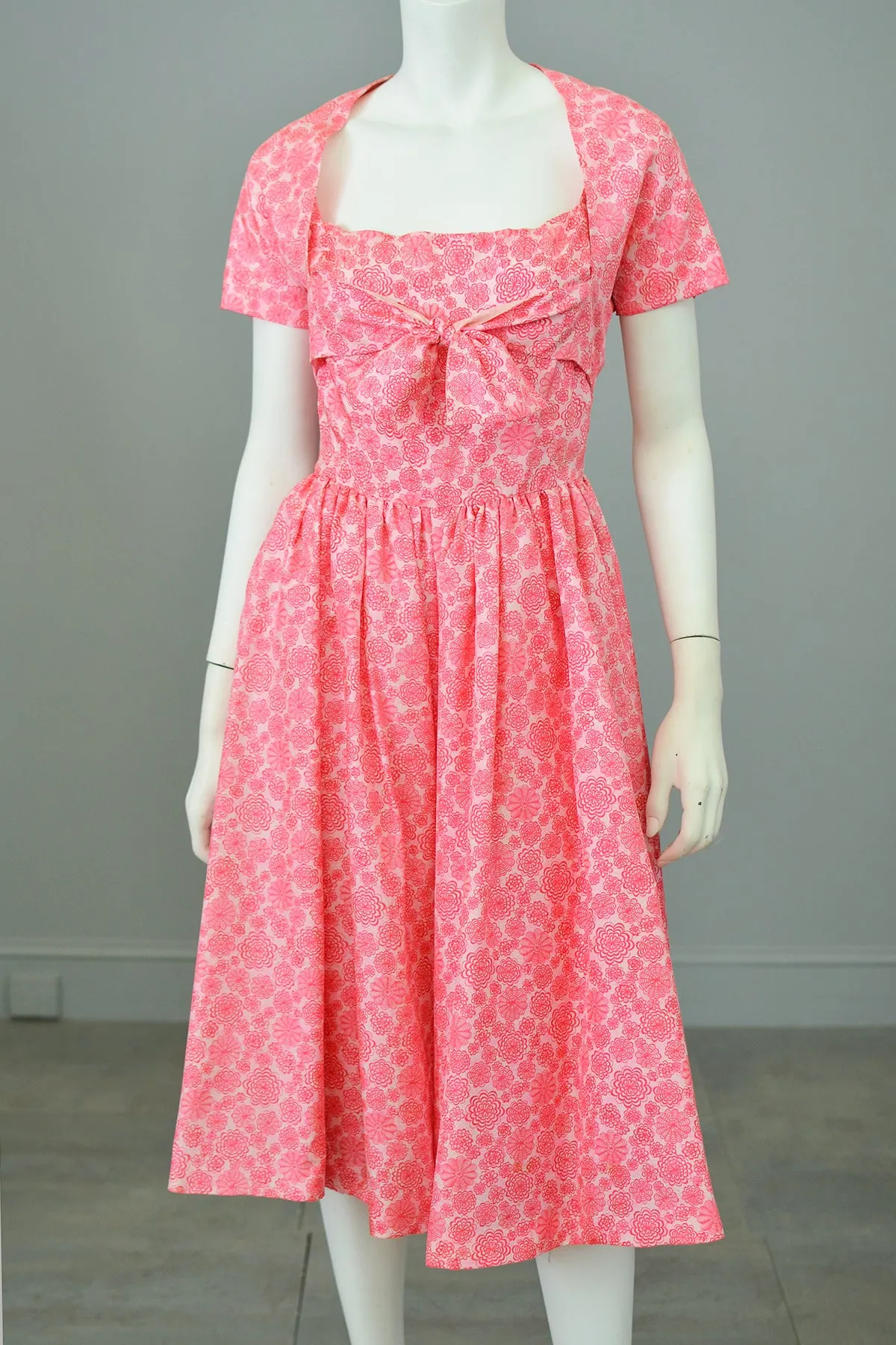 1950s Barbie Hot Pink Pinwheels Print Fit and Flare Party Dress with Attached Tie Front Shrug